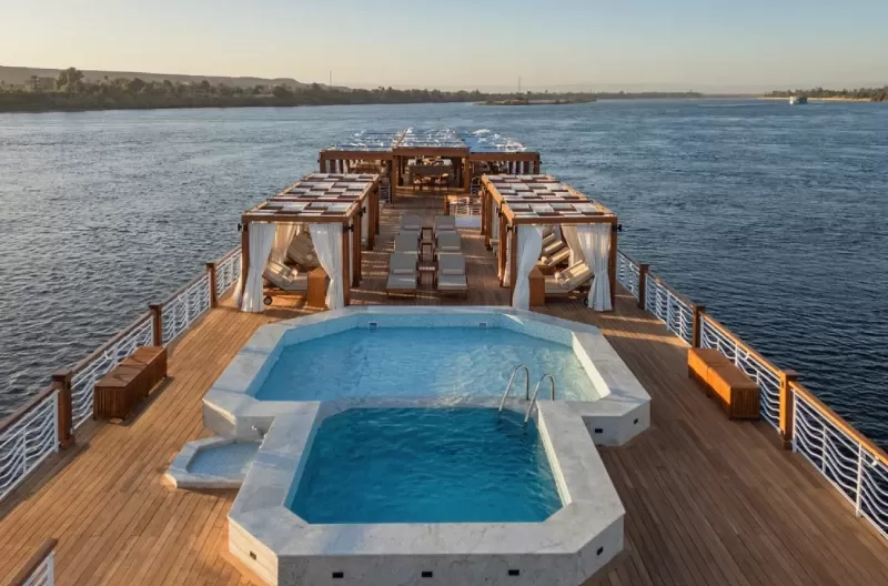 Relaxing moments on the sun deck of Steigenberger Senator Nile Cruise – sunbeds, open skies, and breathtaking Nile views